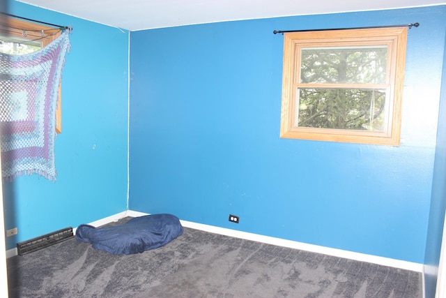 bedroom featuring baseboards and carpet floors