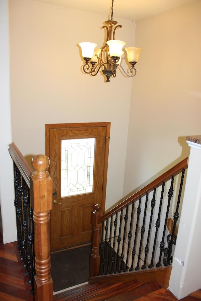 entrance foyer with a chandelier