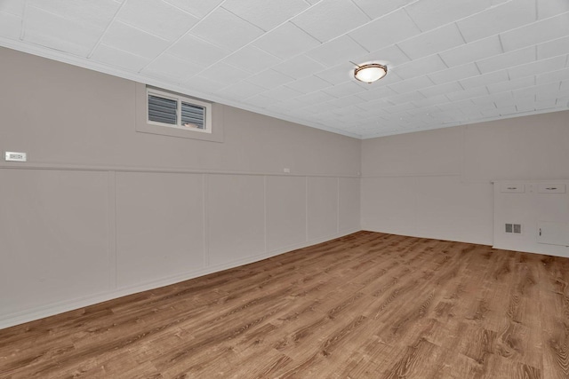 3811 N Pioneer Ave, Chicago, IL 60634 - spare room with ornamental molding, light wood-type flooring, and a decorative wall