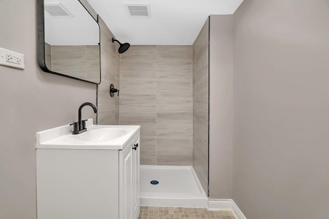 3811 N Pioneer Ave, Chicago, IL 60634 - full bath with a tile shower, vanity, and tile patterned flooring