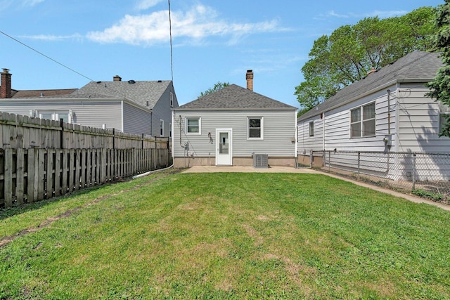 3811 N Pioneer Ave, Chicago, IL 60634 - back of property with central AC and a patio area