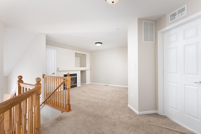 921 Winners Cup Ct, Naperville, IL 60565 - hall with an upstairs landing, carpet flooring, and baseboards