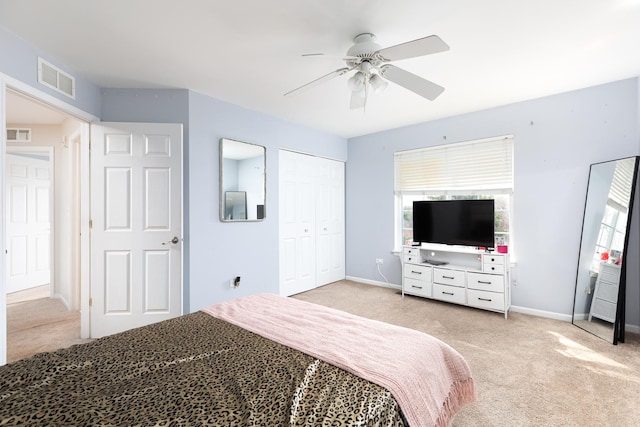 921 Winners Cup Ct, Naperville, IL 60565 - bedroom featuring light carpet, baseboards, a closet, and ceiling fan
