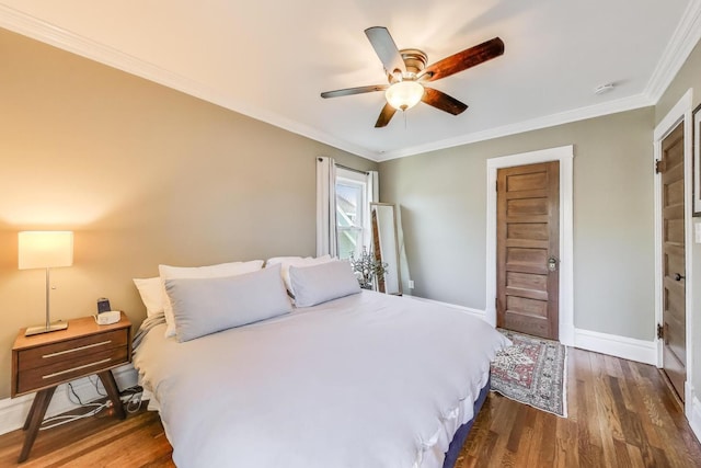 518 Clarence Ave, Oak Park, IL 60304 - bedroom with wood finished floors, crown molding, baseboards, and a ceiling fan