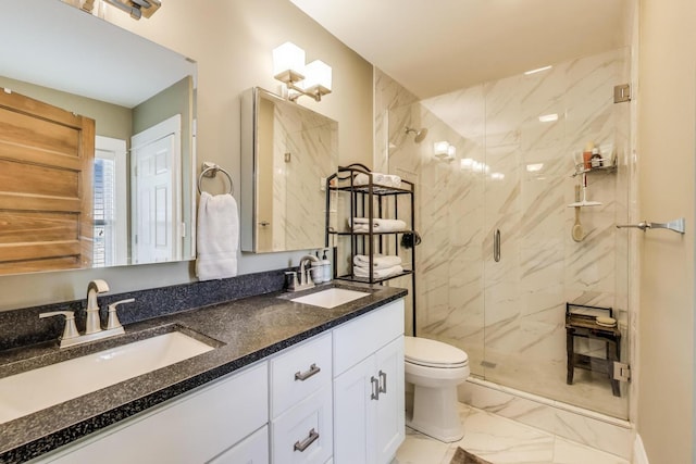 518 Clarence Ave, Oak Park, IL 60304 - bathroom featuring marble finish floors, a shower stall, toilet, and double vanity