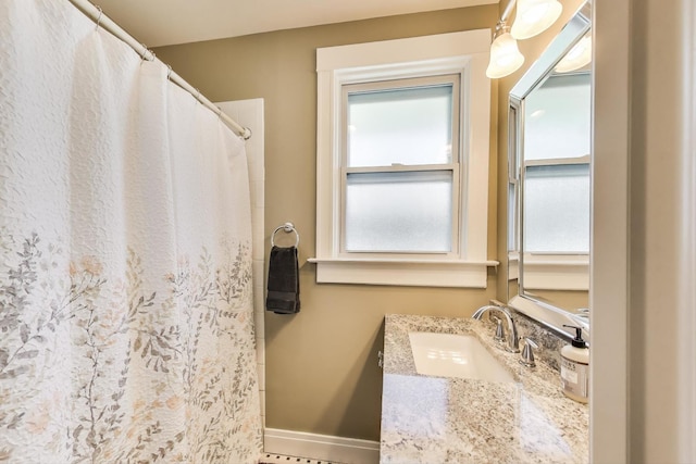 518 Clarence Ave, Oak Park, IL 60304 - full bathroom featuring healthy amount of natural light, baseboards, vanity, and a shower with curtain