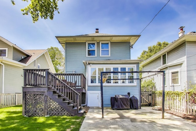 518 Clarence Ave, Oak Park, IL 60304 - back of property with a wooden deck, stairs, a patio area, and a chimney