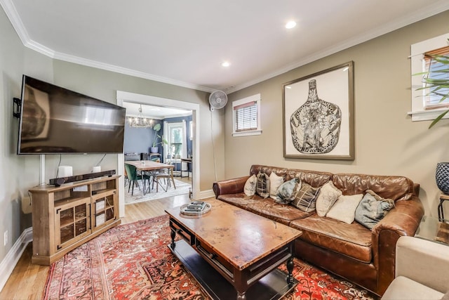 518 Clarence Ave, Oak Park, IL 60304 - living area with wood finished floors, crown molding, baseboards, a chandelier, and recessed lighting