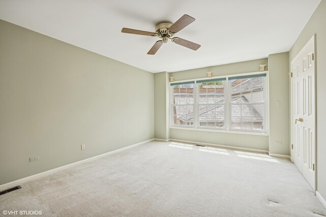 1924 W Ashbury Ln, Inverness, IL 60067 - carpeted spare room featuring baseboards and a ceiling fan