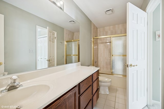 1924 W Ashbury Ln, Inverness, IL 60067 - full bath featuring tile patterned floors, vanity, shower / bath combination with glass door, and toilet