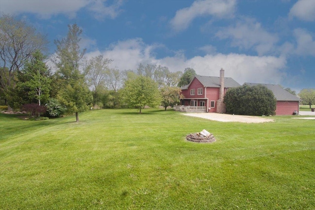 5 Piper Ln, Hawthorn Woods, IL 60047 - view of grassy yard featuring a fire pit