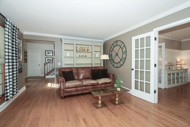 5 Piper Ln, Hawthorn Woods, IL 60047 - living area featuring wood finished floors, stairs, ornamental molding, baseboards, and french doors