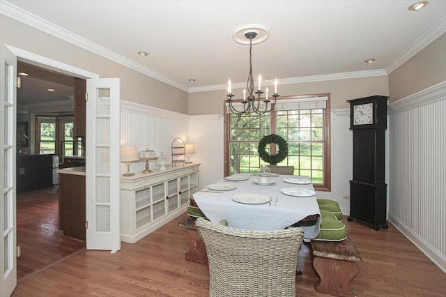 5 Piper Ln, Hawthorn Woods, IL 60047 - dining room with a chandelier, wood finished floors, ornamental molding, and wainscoting