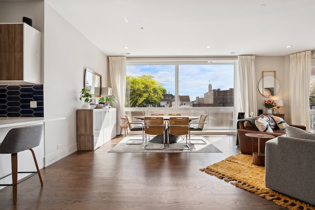 3101 N Ridgeway Ave Unit 2C, Chicago, IL 60618 - dining space featuring wood finished floors, a wall of windows, recessed lighting, and baseboards