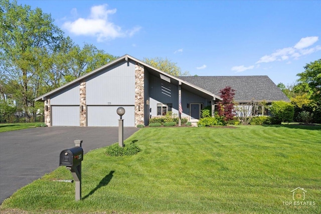 203 Royal Ct, Prospect Heights, IL 60070 - mid-century home featuring a front lawn, stone siding, a garage, and asphalt driveway