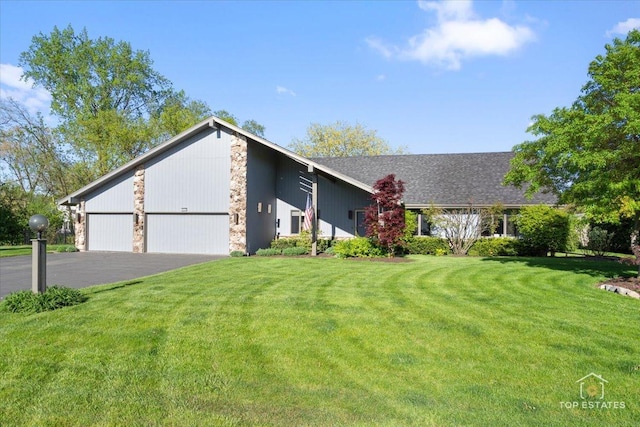 203 Royal Ct, Prospect Heights, IL 60070 - view of front of house with a garage, a front lawn, asphalt driveway, and stone siding