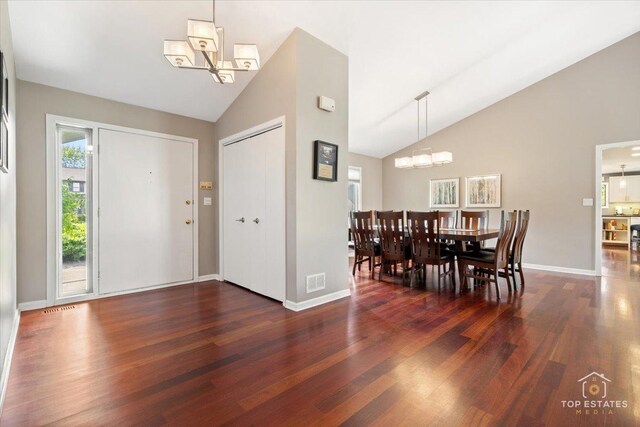 203 Royal Ct, Prospect Heights, IL 60070 - foyer with a chandelier, wood finished floors, high vaulted ceiling, and baseboards