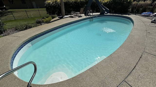 203 Royal Ct, Prospect Heights, IL 60070 - view of swimming pool featuring a water slide, fence, and a patio