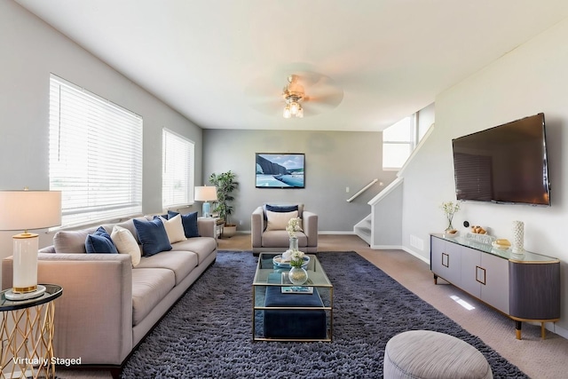 433 Minuet Cir, Volo, IL 60073 - carpeted living area with healthy amount of natural light, stairway, a ceiling fan, and baseboards