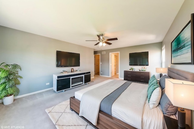 433 Minuet Cir, Volo, IL 60073 - bedroom with baseboards, light carpet, and ceiling fan