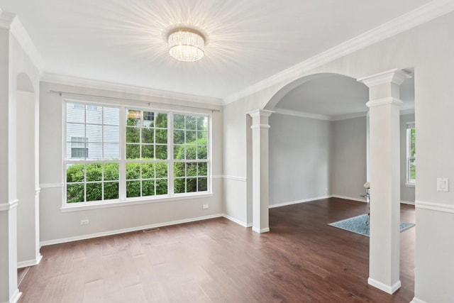 2913 Glenarye Dr, Lindenhurst, IL 60046 - unfurnished room with ornate columns, arched walkways, wood finished floors, plenty of natural light, and crown molding