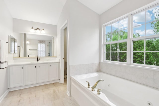 2913 Glenarye Dr, Lindenhurst, IL 60046 - full bathroom featuring healthy amount of natural light, a whirlpool tub, and vanity