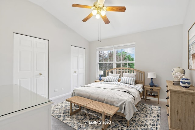 2913 Glenarye Dr, Lindenhurst, IL 60046 - carpeted bedroom featuring two closets, vaulted ceiling, baseboards, and a ceiling fan