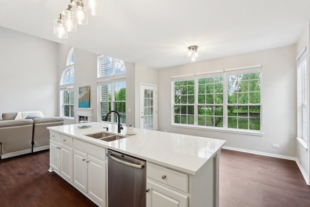 2913 Glenarye Dr, Lindenhurst, IL 60046 - kitchen with a sink, stainless steel dishwasher, dark wood-style flooring, open floor plan, and white cabinets