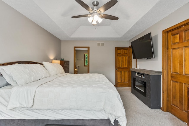 2610 Worthington Dr, Champaign, IL 61822 - bedroom with a raised ceiling, light colored carpet, and a ceiling fan