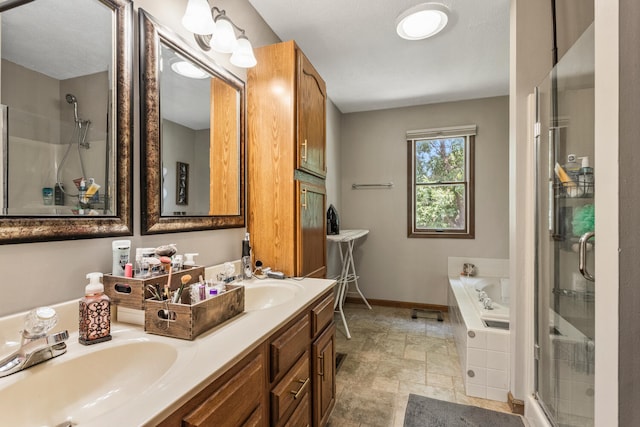2610 Worthington Dr, Champaign, IL 61822 - full bath featuring a bath, a stall shower, double vanity, and baseboards