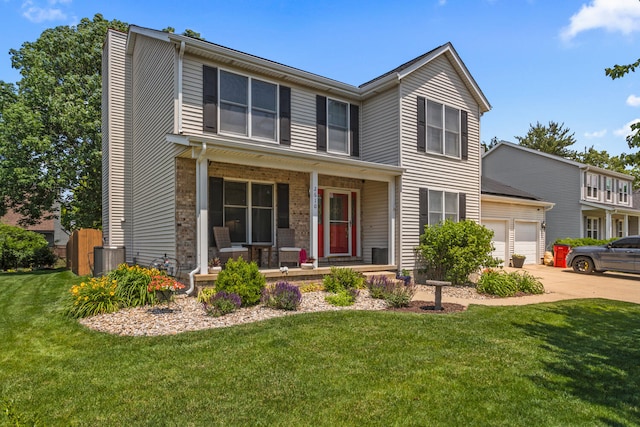 2610 Worthington Dr, Champaign, IL 61822 - view of front facade featuring a porch, a garage, driveway, a front yard, and a chimney