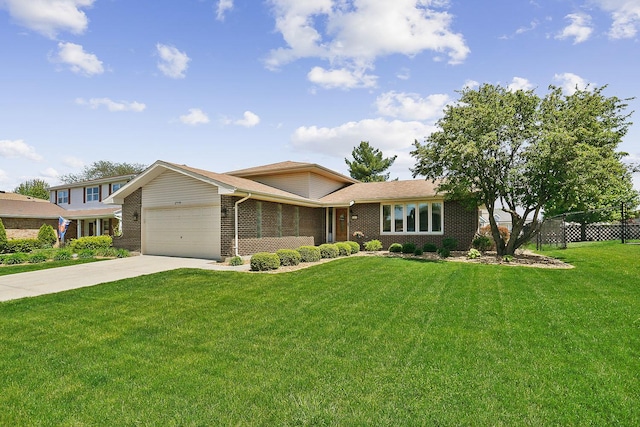 17719 Oakwood Dr, Tinley Park, IL 60487 - view of front of property with brick siding, an attached garage, and driveway