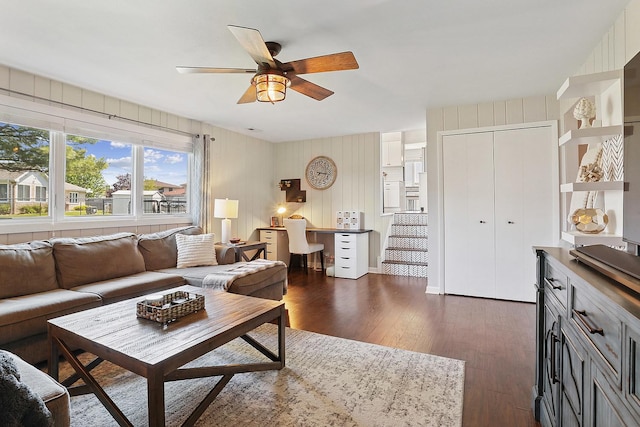 17719 Oakwood Dr, Tinley Park, IL 60487 - living area with a ceiling fan, dark wood-style floors, stairway, and wooden walls