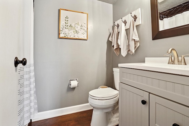 17719 Oakwood Dr, Tinley Park, IL 60487 - bathroom featuring toilet, baseboards, wood finished floors, vanity, and curtained shower