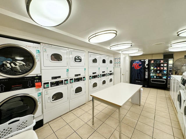 2605 S Indiana Ave Unit 501, Chicago, IL 60616 - community laundry room featuring stacked washer / drying machine, washing machine and clothes dryer, and light tile patterned floors