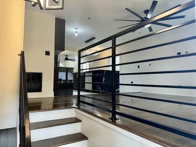 13235 S Vernon Ave, Chicago, IL 60827 - staircase featuring a ceiling fan and wood finished floors