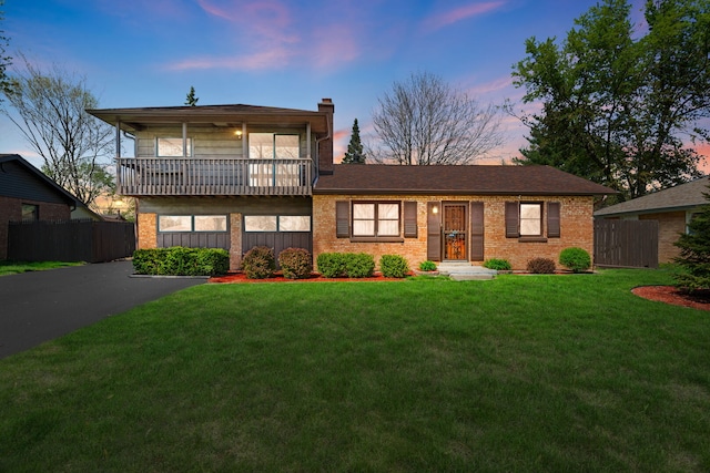 16W340 94th Pl, Burr Ridge, IL 60527 - tri-level home featuring brick siding, a balcony, and a chimney