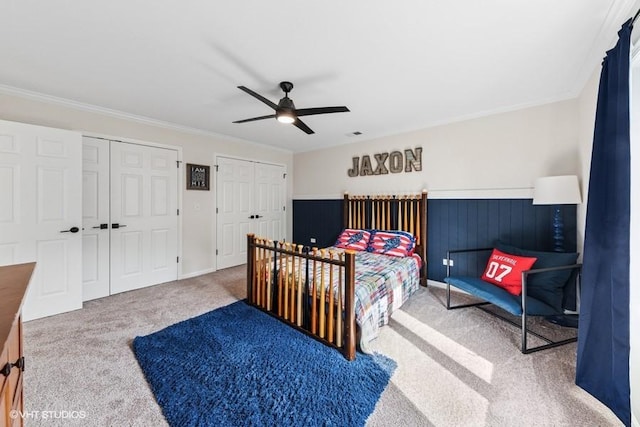 21827 W Riviera Ct, Ivanhoe, IL 60060 - bedroom featuring carpet, two closets, ornamental molding, and ceiling fan