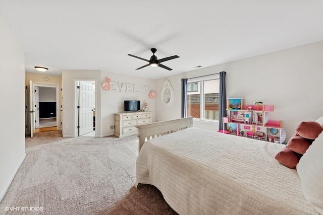 21827 W Riviera Ct, Ivanhoe, IL 60060 - bedroom with baseboards, light carpet, and a ceiling fan