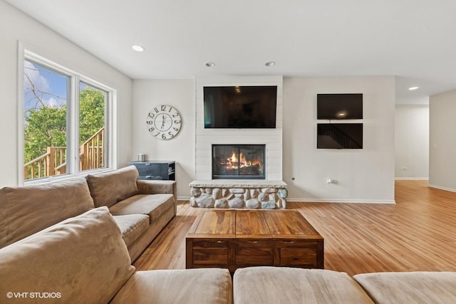 21827 W Riviera Ct, Ivanhoe, IL 60060 - living area with a large fireplace, wood finished floors, baseboards, and recessed lighting