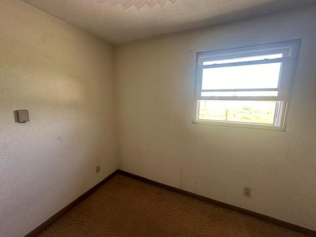 112 Minton St, Joliet, IL 60436 - empty room featuring baseboards and carpet flooring