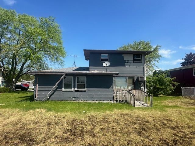 112 Minton St, Joliet, IL 60436 - rear view of property with a yard