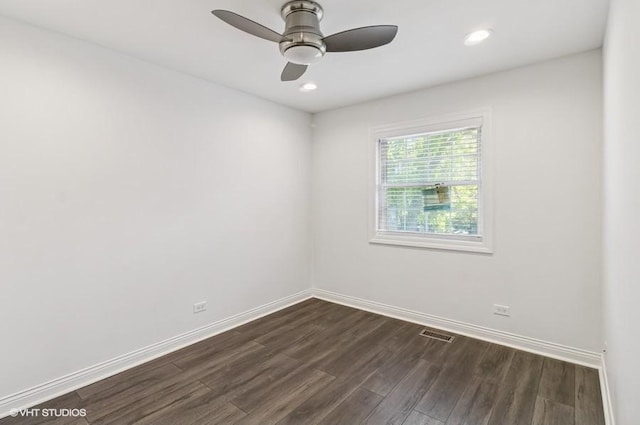 empty room featuring dark wood-style floors, baseboards, ceiling fan, and recessed lighting