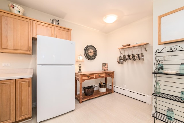 427 Leonard St, Park Ridge, IL 60068 - kitchen featuring freestanding refrigerator, a baseboard radiator, light brown cabinets, light countertops, and light wood finished floors