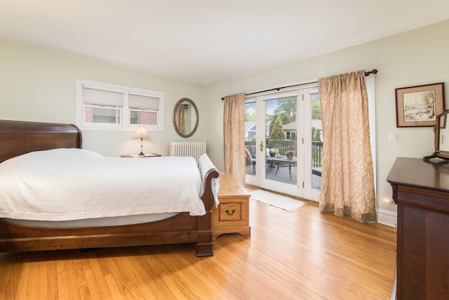 427 Leonard St, Park Ridge, IL 60068 - bedroom with radiator, access to outside, light wood-style floors, and baseboards