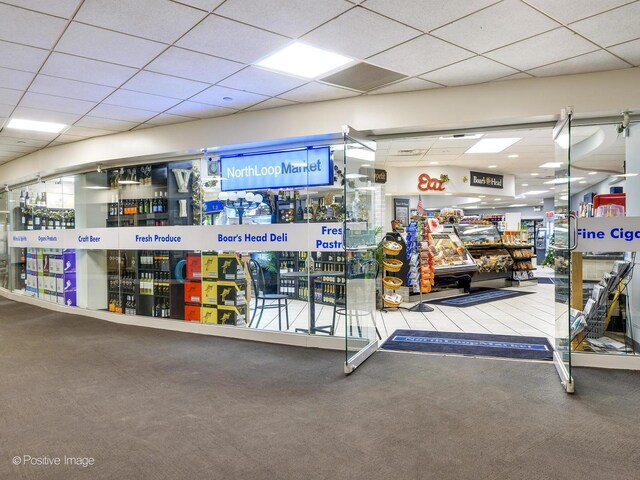 surrounding community with a paneled ceiling