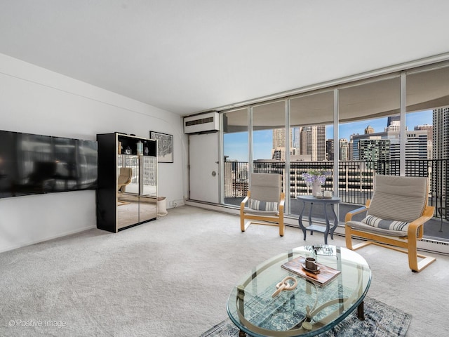 living room featuring carpet, a city view, an AC wall unit, and a wall of windows