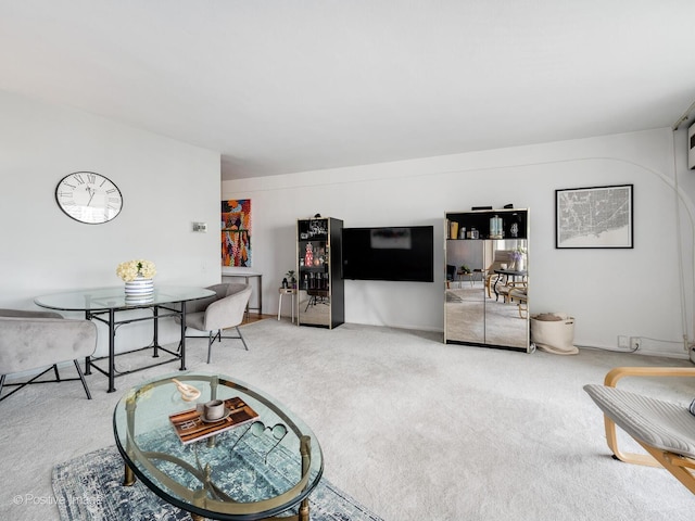 living area with carpet flooring