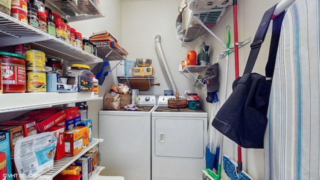 laundry area with washing machine and dryer