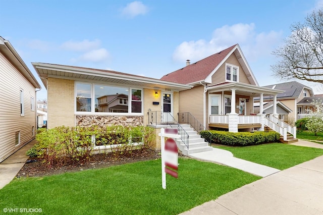 3524 N Natoma Ave, Chicago, IL 60634 - view of front of home with covered porch and a front yard